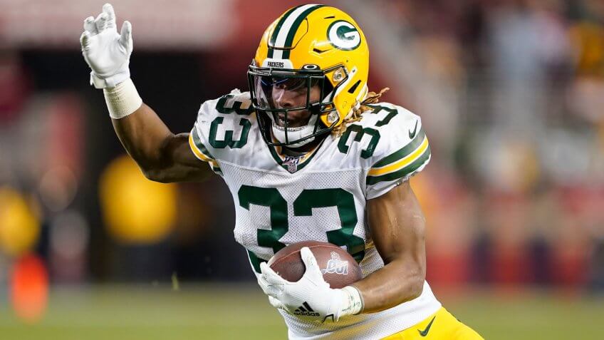 Mandatory Credit: Photo by Tony Avelar/AP/Shutterstock (10530453br)Green Bay Packers running back Aaron Jones (33) runs against the San Francisco 49ers during the second half of the NFL NFC Championship football game, in Santa Clara, CalifNFC Championship Packers 49ers Football, Santa Clara, USA - 19 Jan 2020.