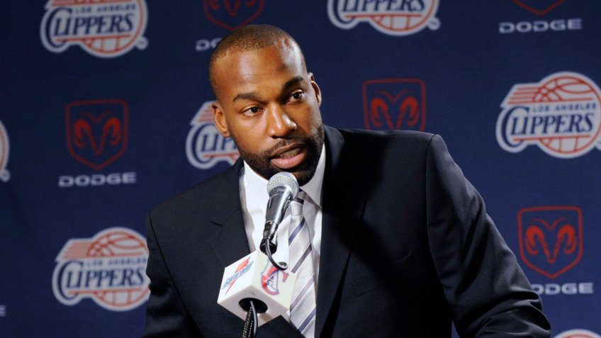 Mandatory Credit: Photo by Chris Pizzello/AP/Shutterstock (6358618d)Baron Davis; Mike Dunleavy Point guard Baron Davis, right, answers a question as Los Angeles Clippers head basketball coach Mike Dunleavy looks on during a news conference to announce Davis's signing to a multi-year contract with the Clippers in Los AngelesClippers Davis Basketball, Los Angeles, USA.
