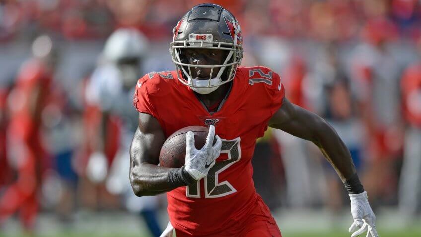 Mandatory Credit: Photo by Jason Behnken/AP/Shutterstock (10495469a)Tampa Bay Buccaneers wide receiver Chris Godwin (12) runs with the football after a reception against the Indianapolis Colts during the first half of an NFL football game, in Tampa, FlaBuccaneers Football, Tampa, USA - 08 Dec 2019.