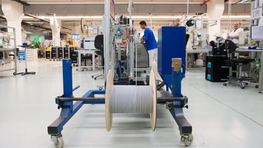 Motor driven coil and spool winder and operator for winding cables, tubes, plastic profiles and simultaneously carry out length measuring and cutting, Sofia, FESTO Bulgaria, September 11, 2015.