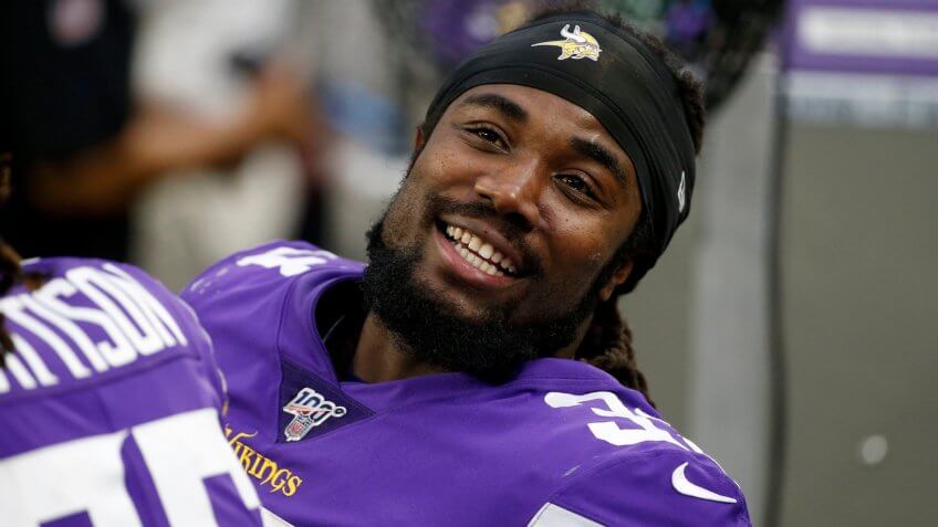 Mandatory Credit: Photo by Bruce Kluckhohn/AP/Shutterstock (10494805cx)Minnesota Vikings running back Dalvin Cook sits on the bench during the first half of an NFL football game against the Detroit Lions, in MinneapolisLions Vikings Football, Minneapolis, USA - 08 Dec 2019.
