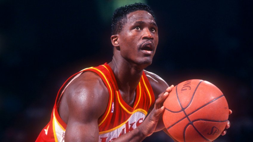 PHILADELPHIA, PA - FEBRUARY 27: Dominique Wilkins #21 of the Atlanta Hawks shoots the free-throw during an NBA game against the Philadelphia 76ers on February 27, 1991 at the Spectrum in Philadelphia, Pennsylvania.