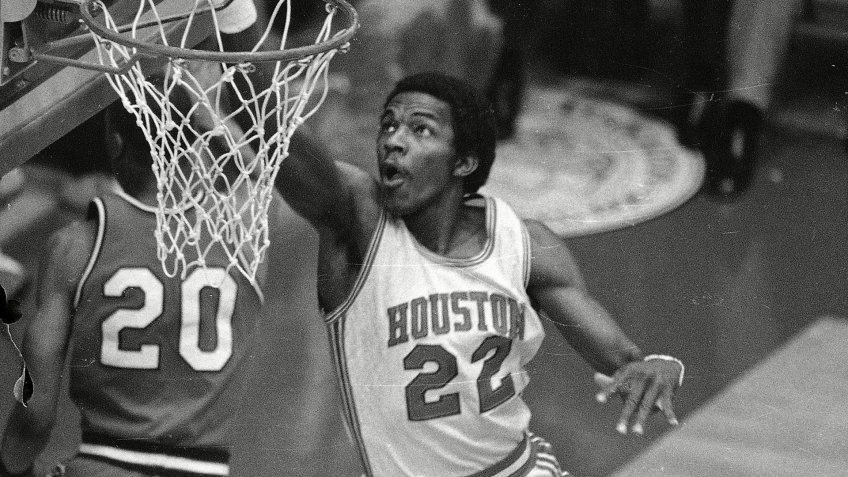 Drexler Clyde dunks the ball during NCAA play between Houston and Louisville in Albuquerque, N.
