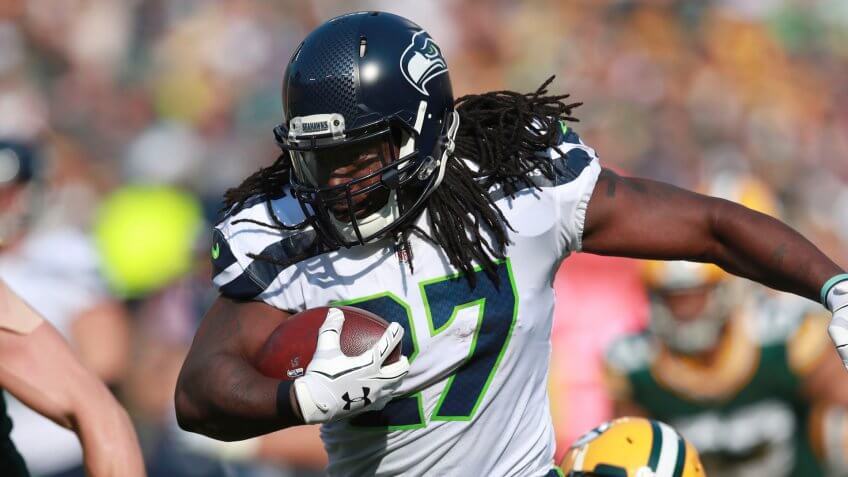 Mandatory Credit: Photo by AP/Shutterstock (9175898ax)Seattle Seahawks running back Eddie Lacy (27) runs the ball against the Green Bay Packers during an NFL football game, in Green Bay, WisSeahawks Packers Football, Green Bay, USA - 10 Sep 2017.