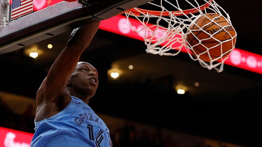 ATLANTA, GEORGIA - MARCH 02: Gorgui Dieng #14 of the Memphis Grizzlies dunks against the Atlanta Hawks in the second half at State Farm Arena on March 02, 2020 in Atlanta, Georgia.