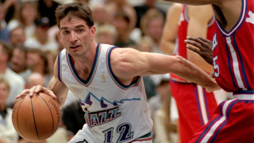 STOCKTON MARTIN Utah Jazz guard John Stockton glides past Los Angeles Clippers guard Darrick Martin on his way to the basket in the fourth quarter, in Salt Lake City.