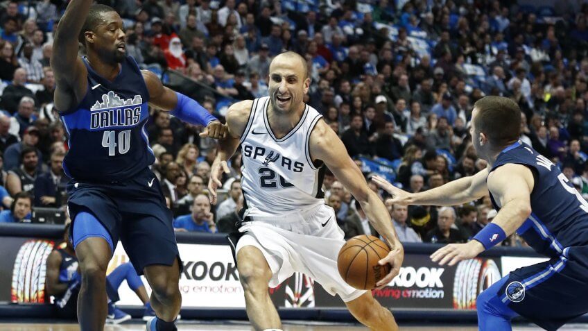 Manu GinobiliSan Antonio Spurs at Dallas Mavericks, USA - 12 Dec 2017San Antonio Spurs guard Manu Ginobili (C) of Argentina drives to the basket against Dallas Mavericks players Harrison Barnes (L) and Jose Juan Barea (R) of Puerto Rico in the first half of the NBA basketball game between the San Antonio Spurs and the Dallas Mavericks at the American Airlines Center in Dallas, Texas, USA, 12 December 2017.