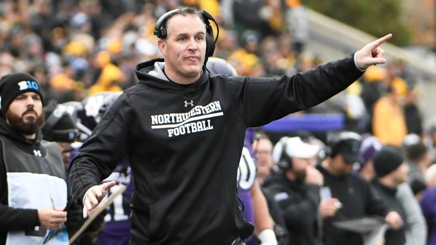 Northwestern head coach Pat Fitzgerald gestures to his team during the first half of an NCAA college football game against Iowa, in Evanston, IllIowa Northwestern Football, Evanston, USA - 26 Oct 2019.