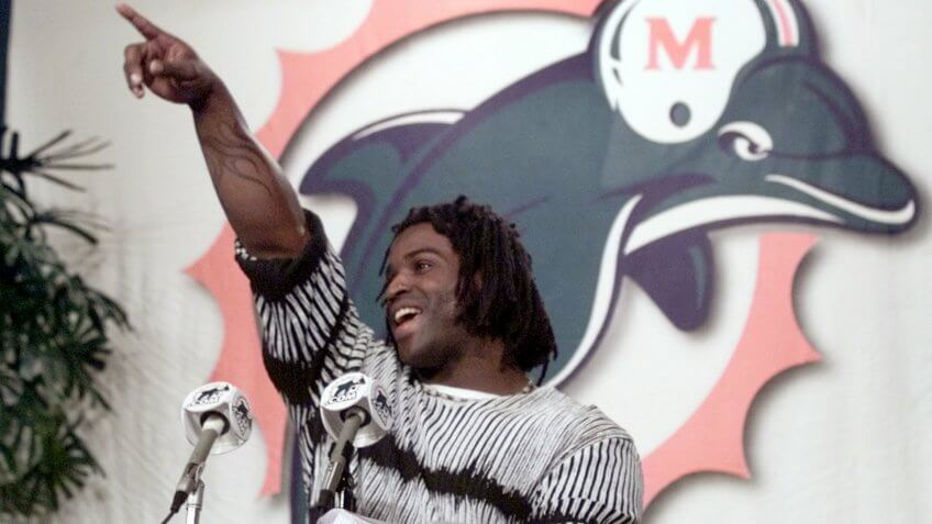 Mandatory Credit: Photo by Wilfredo Lee/AP/Shutterstock (6456052c)WILLIAMS Miami Dolphins new running back Ricky Williams gestures as he answers questions during a news conference, at the Dolphins training facility in Davie, Fla.