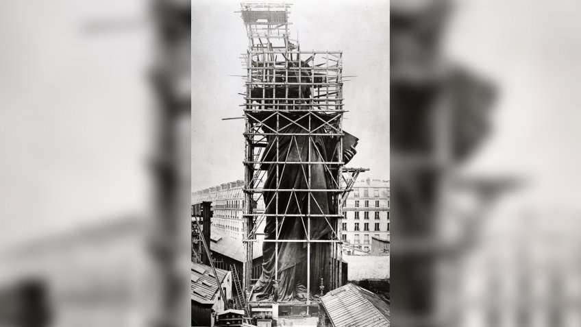 Statue of Liberty in scaffolding at its manufacturing site in Paris before it was shipped to New York city, 1883, plate 12 from "Album des Travaux de Construction de la Statue Colossale de la Liberté destinée au Port de New-York"Art - various.