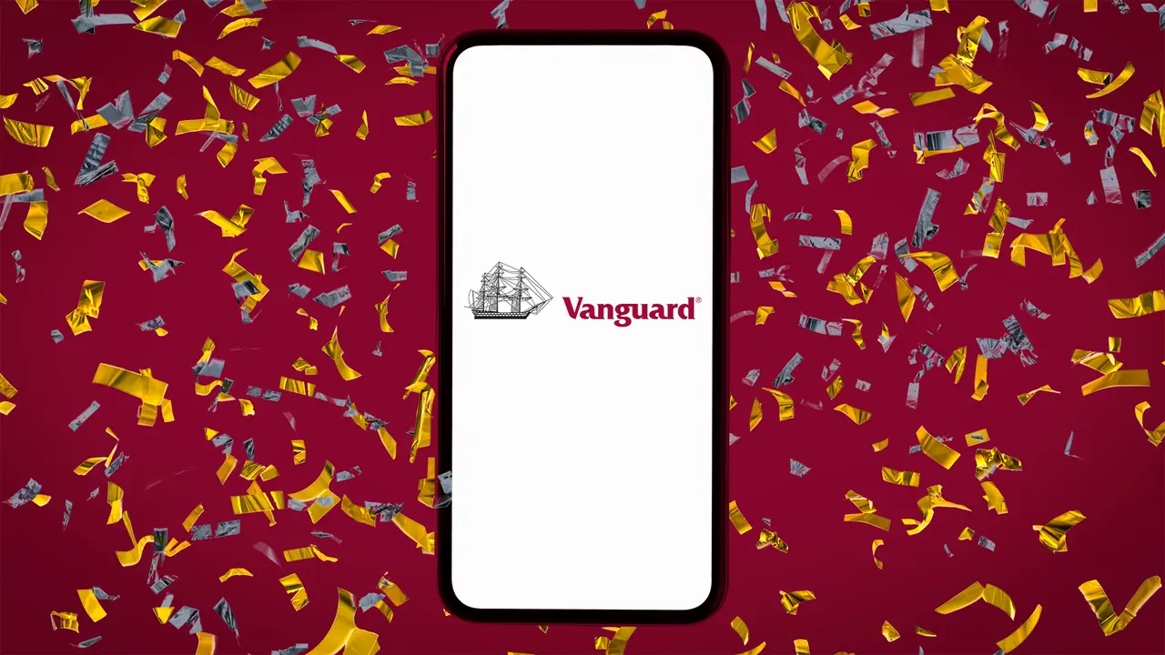 Dark red background covered with confetti and a smartphone on top displaying the Vanguard logo on the screen