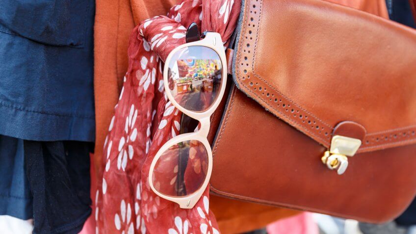 bags and glasses at garage sale