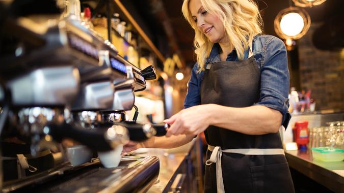 Women working at coffee shop.