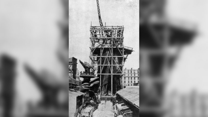 circa 1885: The framework for the right arm of the Statue Of Liberty during construction in Paris.