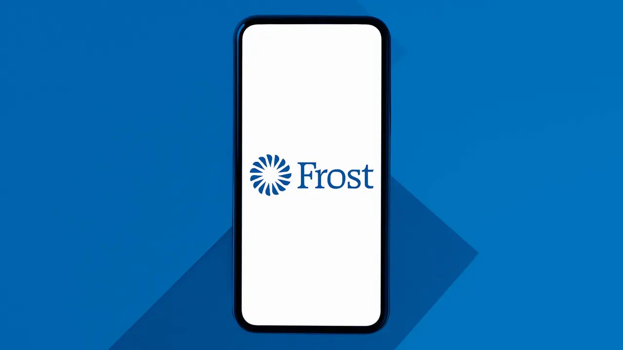 Dark blue background with a smartphone on top that's displaying the Frost Bank logo on the screen