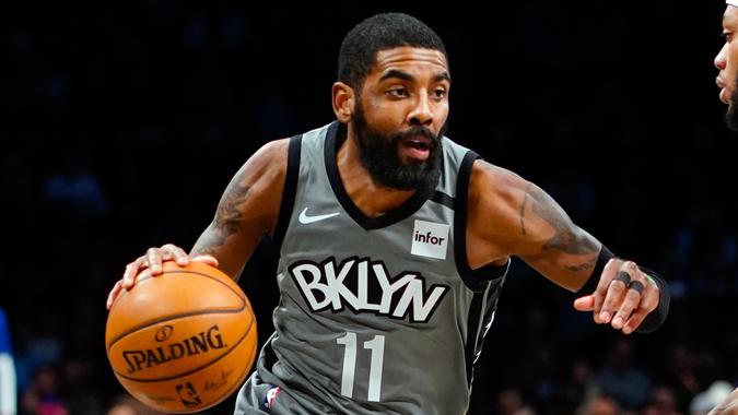NEW YORK, NY - JANUARY 29:  Kyrie Irving #11 of the Brooklyn Nets drives in an NBA basketball game against the Detroit Pistons on January 29, 2020 at Barclays Center in the Brooklyn borough of New York City.