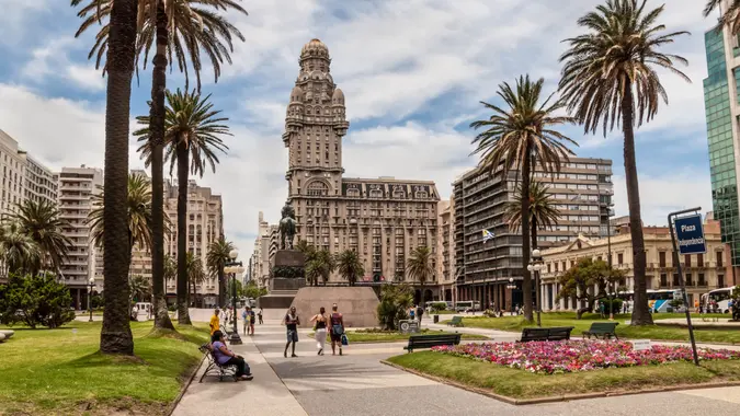 Montevideo, Uruguay - December 15, 2012: Plaza indepedencia with the building Palacio Salvo and the statue of Jose Artigas in Montevideo, Uruguay.