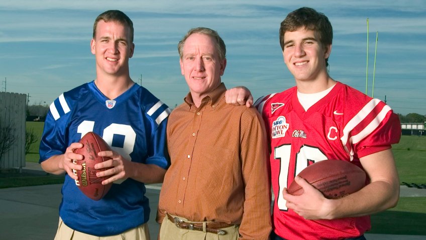2004: (l-r) Peyton Manning, Archie Manning and Eli Manning pose for a picture.