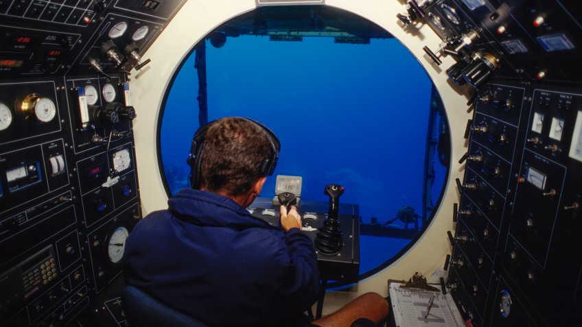 Inside cockpit of underwater submarine.