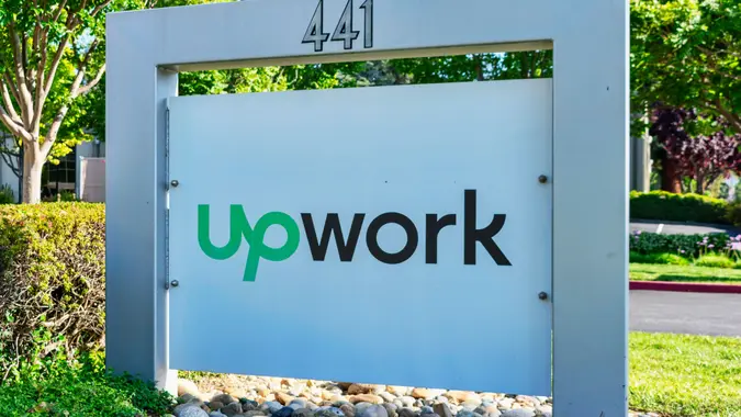 UpWork sign and logo near global freelancing platform company headquarters in Silicon Valley - Mountain View, California, USA - May 29, 2019.