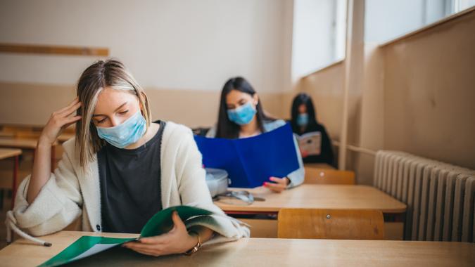 High school students in the benches after the pandemic corona virus.