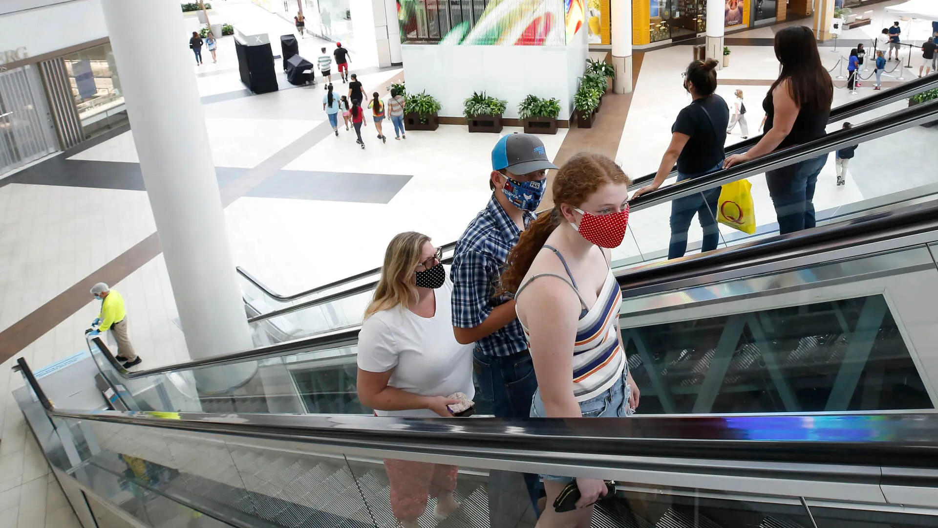 Mandatory Credit: Photo by Rich Pedroncelli/AP/Shutterstock (10684108a)People wearing face masks take an escalator to the second floor of the Arden Fair Mall in Sacramento, Calif.