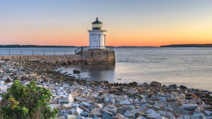 South Portland, Maine, USA with the Portland Breakwater Light at dawn.
