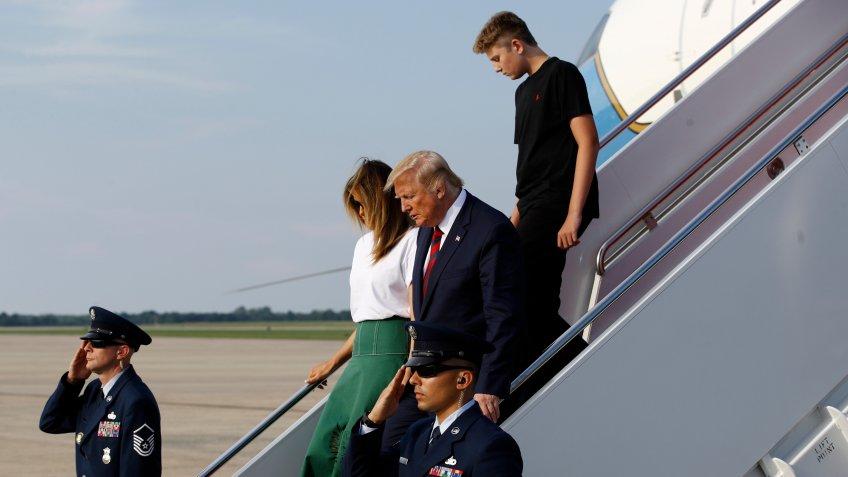 Mandatory Credit: Photo by Patrick Semansky/AP/Shutterstock (10364760e)President Donald Trump steps off Air Force One with first lady Melania Trump and son Barron Trump at Andrews Air Force Base, Md.