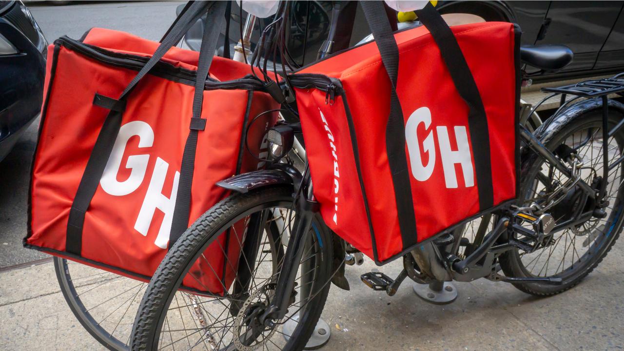 A delivery person's bicycle with GrubHub branded totes in the Chelsea neighborhood of New York