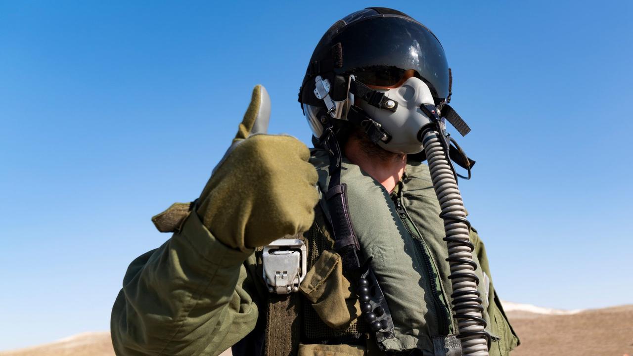 Pilot with suit and military air.