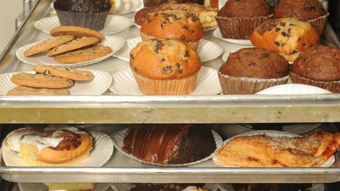 Cafeteria cart filled with desserts_12115618