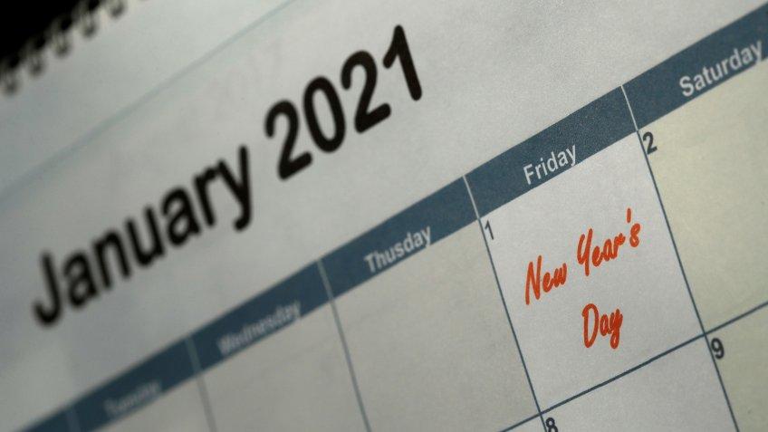 Mandatory Credit: Photo by Charlie Riedel/AP/Shutterstock (10712789b)New Year's Day is seen on a 2021 calendar, in Overland Park, KanNew Year's Day, Kansas City, United States - 10 Jul 2020.