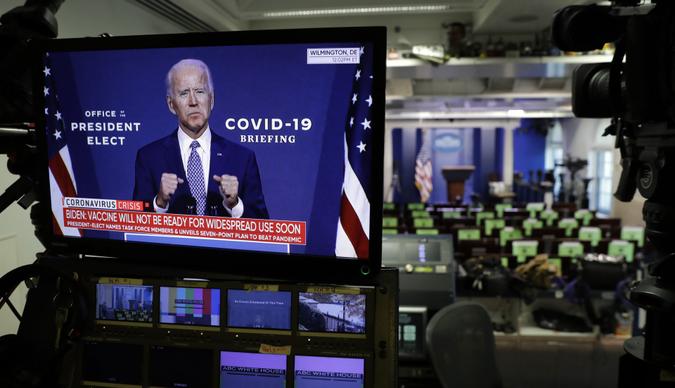 Mandatory Credit: Photo by Shutterstock (11009306d)Democratic President-elect Joe Biden is seen during his statement on television monitors in the briefing room at the White House in Washington.