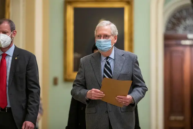 Mandatory Credit: Photo by SHAWN THEW/EPA-EFE/Shutterstock (11559659e)Senate Majority Leader Mitch McConnell walks to the Senate Floor in the US Capitol in Washington, DC, USA, 16 December 2020.