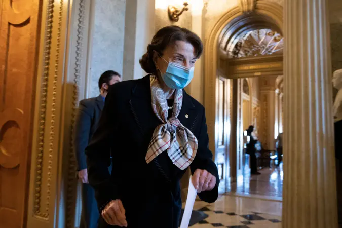 Mandatory Credit: Photo by MICHAEL REYNOLDS/EPA-EFE/Shutterstock (11574686r)Democratic Senator from California Dianne Feinstein walks from the Senate floor on Capitol Hill in Washington, DC, USA, 17 December 2020.