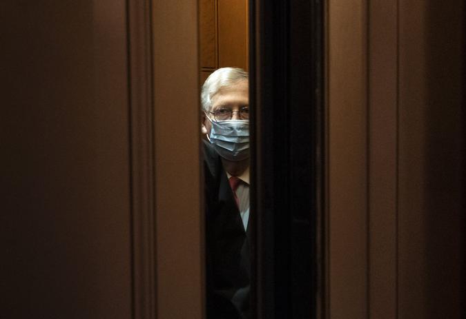 Mandatory Credit: Photo by Kevin Dietsch/UPI/Shutterstock (11664327e)Senate Majority Leader Mitch McConnell, R-KY, takes an elevator as he leaves his office at the U.