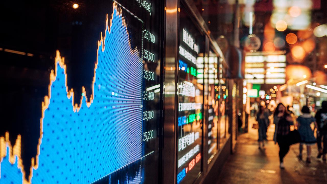 Financial stock exchange market display screen board on the street.