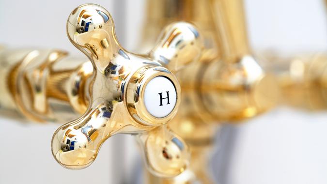 Close-up of a gold faucet for hot water in a bathroom Capturefile: C:Documents and SettingsTore Johannesen.