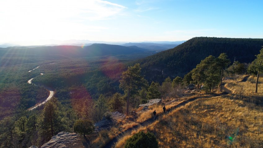 The highway snakes along at the bottom of the mogollon rim.