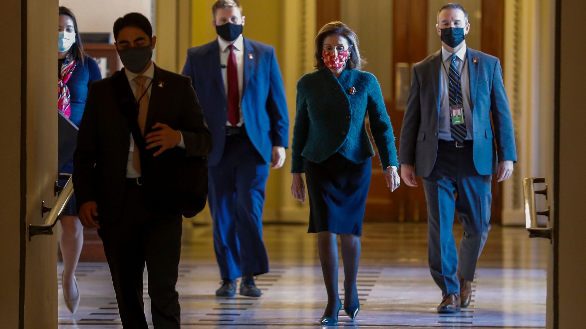 Mandatory Credit: Photo by SHAWN THEW/EPA-EFE/Shutterstock (11670628a)Speaker of the House Nancy Pelosi walks to her office from the House floor in the US Capitol in Washington, DC, USA, 28 December 2020.