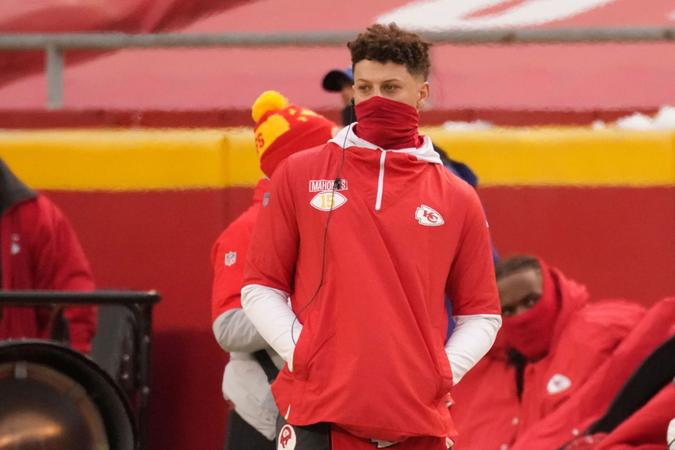 Mandatory Credit: Photo by Charlie Riedel/AP/Shutterstock (11677888bw)Kansas City Chiefs quarterback Patrick Mahomes watches from the sideline during the first half of an NFL football game against the Los Angeles Chargers, in Kansas CityChargers Chiefs Football, Kansas City, United States - 03 Jan 2021.
