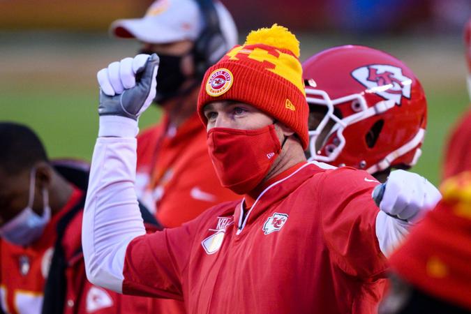 Mandatory Credit: Photo by Reed Hoffmann/AP/Shutterstock (11677888iv)Kansas City Chiefs tight end Travis Kelce watches from the sidelines during the first half of an NFL football game against the Los Angeles Chargers, in Kansas City, MoChargers Chiefs Football, Kansas City, United States - 03 Jan 2021.