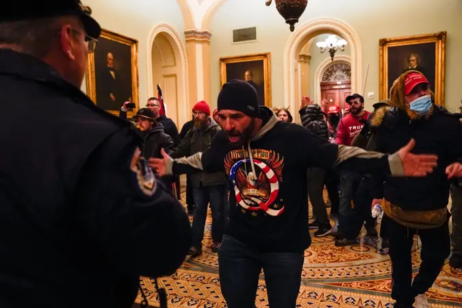 Mandatory Credit: Photo by Manuel Balce Ceneta/AP/Shutterstock (11694690h)Protesters gesture to U.