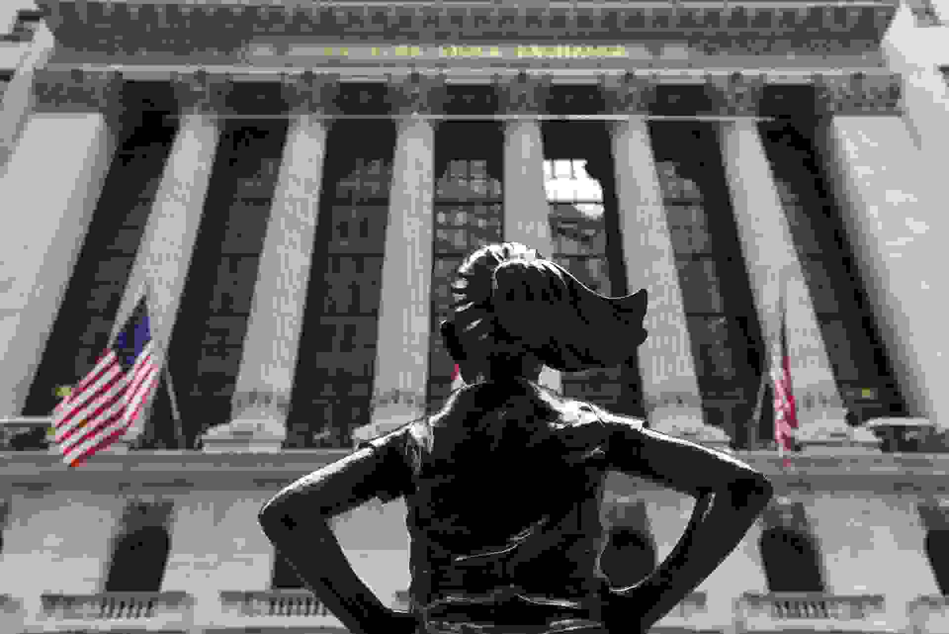 Mandatory Credit: Photo by Erik Pendzich/Shutterstock (11728929h)The Fearless Girl bronze sculpture by Kristen Visbal stands across from the New York Stock Exchange on Wall StreetCoronavirus outbreak, New York, USA - 27 Jan 2021.