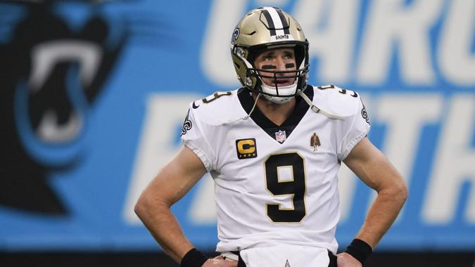 Mandatory Credit: Photo by Gerry Broome/AP/Shutterstock (11677866m)New Orleans Saints quarterback Drew Brees watches during warm ups before an NFL football game against the Carolina Panthers, in Charlotte, N.