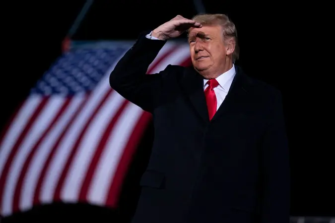 Mandatory Credit: Photo by Evan Vucci/AP/Shutterstock (11696349a)President Donald Trump arrives to speak at a campaign rally for Sen.