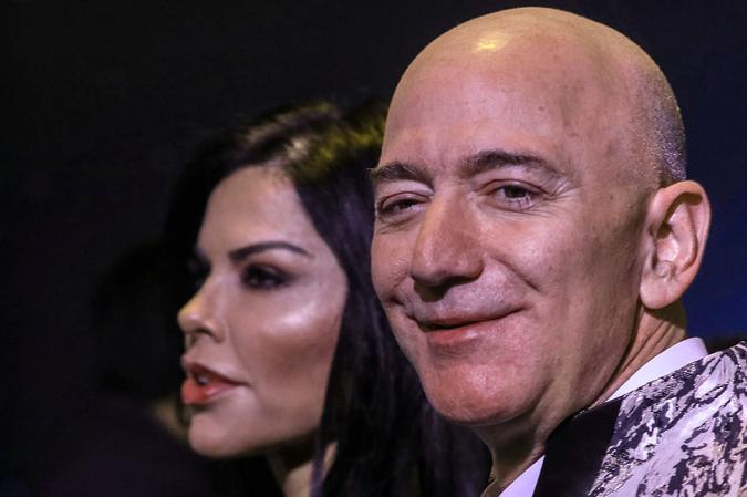 Mandatory Credit: Photo by DIVYAKANT SOLANKI/EPA-EFE/Shutterstock (10528180a)Amazon Founder and CEO Jeff Bezos (R) and his partner, US new anchor Lauren Sanchez (L), poses for photographs during an event in Mumbai, India, 16 January 2020.