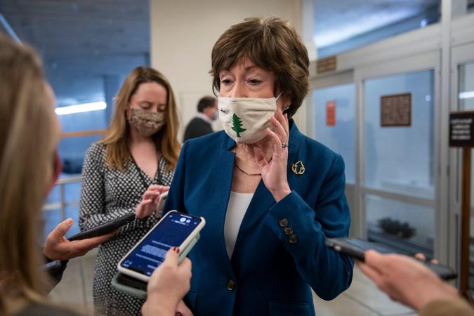 Mandatory Credit: Photo by Shutterstock (11734256m)United States Senator Susan Collins (Republican of Maine) talks with reporters as she walks through the Senate subway following a Senate procedural vote to advance the nomination of Alejandro Mayorkas as secretary of homeland security, at the U.