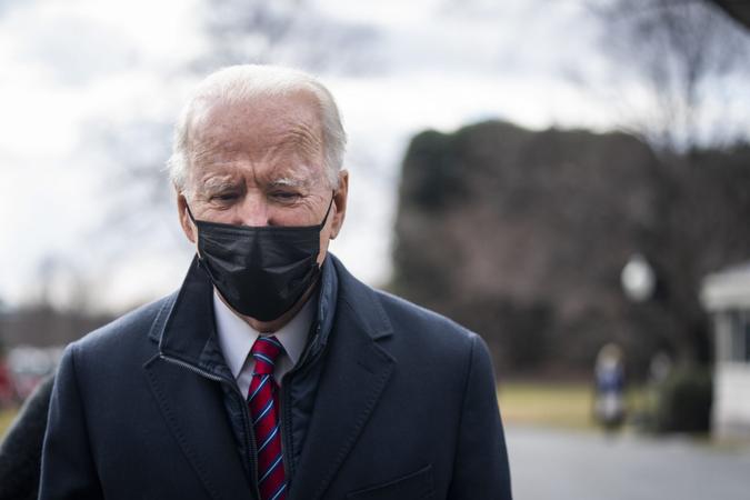 Mandatory Credit: Photo by JIM LO SCALZO/UPI/Shutterstock (11736714c)US President Joe Biden speaks briefly to the media before departing the White House for a short visit with wounded veterans at Walter Reed Medical CenterPresident Biden departs White House for Walter Reed, Washington DC, USA - 29 Jan 2021.