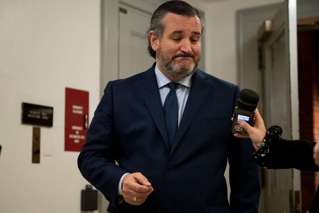 Mandatory Credit: Photo by Shutterstock (11758470w)United States Senator Ted Cruz (Republican of Texas) talks with a reporter during a 15-minute recess on the fifth day of the Senate impeachment trial of former President Donald Trump at the U.